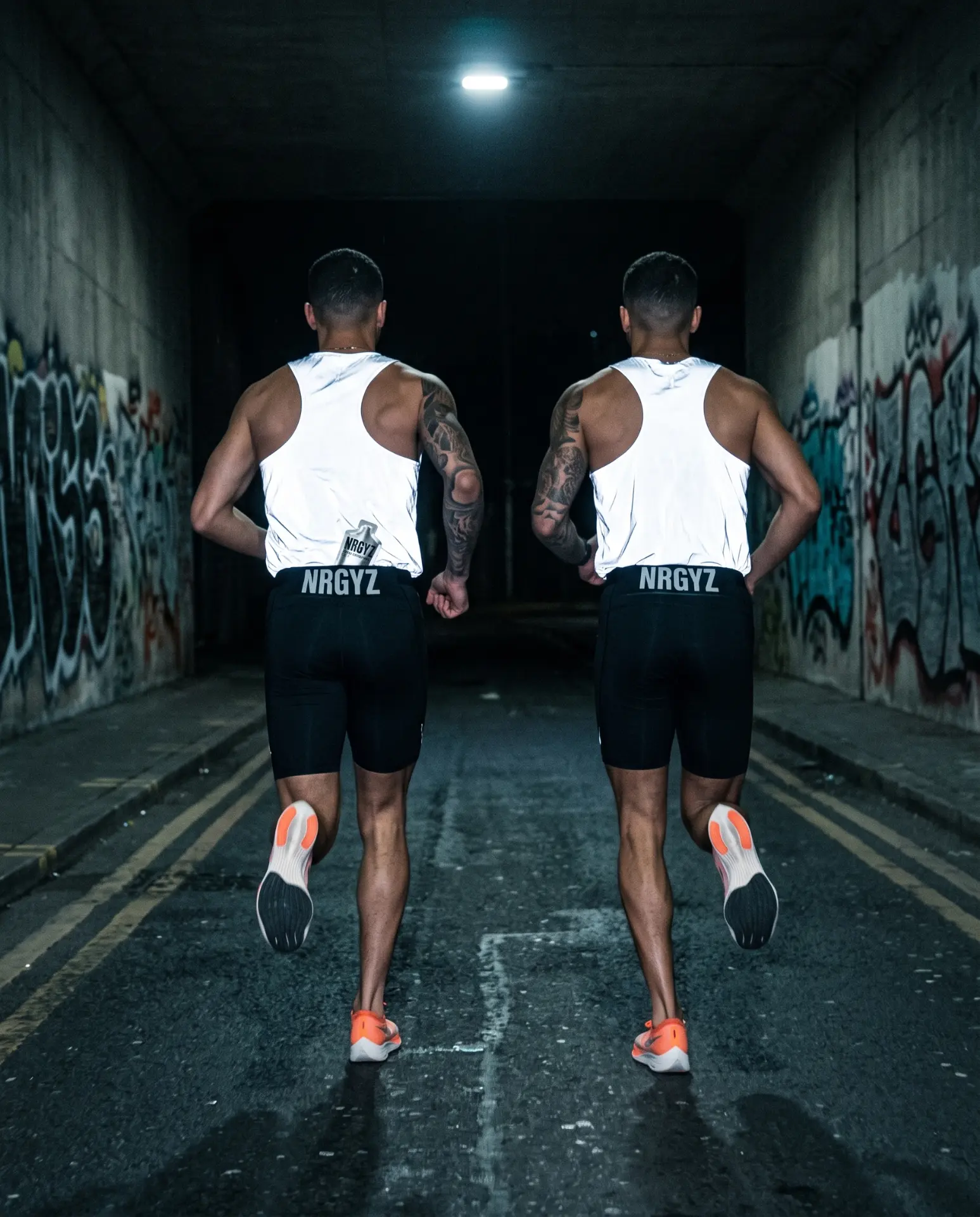 Two runners with NRGYZ energy gel